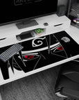 40x20 inches Naruto desk pad featuring Sasuke Uchiha staring forward, Sharingan eyes and Leaf headband.