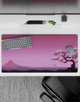 32x16 inches mouse pad with Blossom Horizon, blending a cherry blossom tree with a serene pink sunset and distant mountains for a peaceful atmosphere.