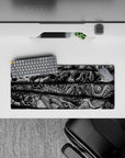 28x12 inches mouse pad showcasing terrifying, intricate creatures from Berserk, ideal for adding dark, chaotic intensity to your workspace.