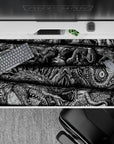 40x20 inches desk pad showcasing terrifying creatures from Berserk, capturing monstrous and chaotic energy with intricate details for a dark, intense workspace.