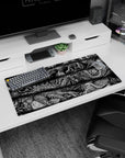 Modern 32x16 inches mouse pad showcasing terrifying, intricate creatures from Berserk, ideal for adding a chaotic, dark atmosphere to your workspace.