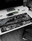 Large 40x20 inches desk pad with terrifying and intricate creatures from Berserk, perfect for fans seeking dark fantasy and otherworldly horrors in their desk setup.
