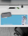 Cute clean desk mat in bright sky-blue and candy pastels with PEKO PEKO pattern, 32x12 inches.