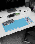Usada Pekora Hololive anime girl mouse pad, cheeky grin with bunny ears and carrots, 32x12 inches.