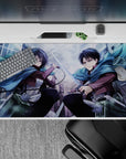 Mikasa and Levi from Attack on Titan clash mid-air on 40x20 inches anime mouse pad, blades poised, eyes intense.