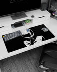 Anime girl mouse pad 32x16 inches showing girl touching collar, cat-ear helmet and blue emblem in spotlight.