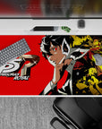 Anime desk pad featuring Persona 5 Royal characters, size 40x20 inches, with Joker, Kasumi, and Futaba in vivid colors.
