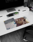 28x12 inches Made in Abyss Nanachi mouse pad, gazing up with tiny tears and drifting green leaf shapes.