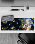 32x12 inches desk mat in deep teal night-pond tones with gold koi ripples, cozy mischievous vibe.