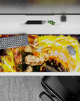 36x16 inches anime desk pad in blazing gold and orange swirls, bold green accents, high-impact action mood.