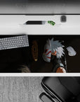 Dark charcoal swirl anime desk pad 36x16 inches with orange spiral mask, crisp whites, red accents.