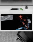 32x16 inches mouse pad with Guts in battle-ready pose, accompanied by Puck, perfect for transforming your workspace with the raw power of the Black Swordsman.