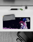 28x12 inches anime mouse pad in midnight navy with crisp white uniform, soft pink treetops, calm vibe.