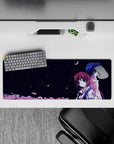 32x12 inches anime mouse pad in midnight navy with crisp white accents and soft pink treetops, calm mood.