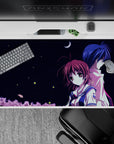 Midnight navy and white anime desk pad 40x20 inches with pink treetops and a quiet after-school mood.