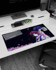 32x16 inches anime mouse pad showing sailor-uniform girl and dark-haired boy beneath crescent moon.