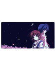 32x16 inches anime mouse pad with two students back to back under a crescent moon and starry sky.