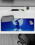 32x12 inches mouse pad showcasing Guts under a full moon in his Berserker Armor, ideal for adding emotional depth and raw power to your desk setup.