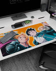 Edward Elric scowling with Alphonse in armor behind, plus Roy Mustang glove raised, desk pad 40x20 inches.