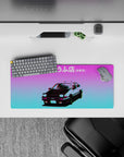 28x12 inches anime mouse pad in purple-to-cyan vaporwave glow with glitchy chroma edges.