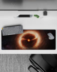Sleepy cosmic mouse pad 32x12 inches in warm orange glow, soft browns, and shadowy blacks.