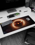 Tiny burning star in amber clouds on space backdrop desk pad 36x16 inches with faint lights.