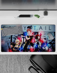 Neon red and electric blue Fairy Tail anime mouse pad 32x16 inches with gritty friendship energy.