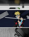 40x20 inches anime desk pad in deep navy with blond spikes and icy blue accents, fast focused mood.