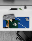 Mouse pad 28x12 inches with a stylized silhouette of a Scout Regiment soldier from Attack on Titan, blades drawn mid-air.