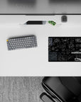 Deep black noir anime mouse pad with fine white line schematics and blue panels, calm tactical mood, 14x10 inches.