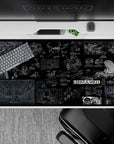 Deep black anime desk pad 40x20 inches with white linework and blue neon schematic panels, moody.