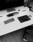 Ghost in the Shell cyberpunk lab-wall scene mouse pad with armor silhouettes and vehicle diagrams, 14x10 inches.