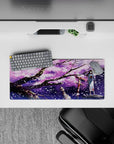 Purple night anime desk mat 28x12 inches in lilac clouds, ink-black branches, and sparkling white sakura.