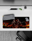 28x12 inches anime mouse pad in hot orange wildfire sky and deep blacks, gritty dark fantasy vibe.