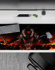36x16 inches anime desk pad in hot oranges and deep blacks, dark fantasy vibe under a wildfire sky.
