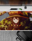 Megumin and Chomusuke from KonoSuba anime on 40x20 inch desk pad, featuring warm sunset tones and sarcastic vibes.