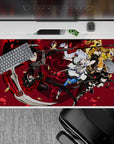 Black-and-red anime desk pad 40x20 inches, bold crimson petals, fast action vibe with shell casings.