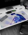 Anime desk pad 40x20 inches showing dark-haired boy in blue jacket hugging teary blonde girl.