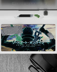 Anime mouse pad 32x16 inches featuring Kirito from Sword Art Online in battle stance, glowing edges, teal shadows.