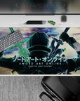 Desk pad featuring Kirito from Sword Art Online, size 40x20 inches, with glowing edges and a dynamic battle theme.