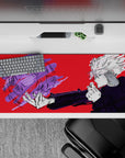 36x16 inches desk pad showcasing Gojo Satoru’s intense focus, with a vibrant red background and dynamic purple force from Jujutsu Kaisen.