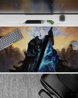 40x20 inches desk pad showcasing Guts in his Berserker Armor, surrounded by ethereal spirits, capturing the dark fantasy essence and epic intensity of Berserk.