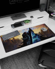 Artistic 36x16 inches desk pad with Guts in his Berserker Armor and ethereal spirits, ideal for fans of Berserk seeking powerful and haunting design for their workspace.