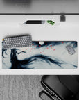 32x12 inches mouse pad featuring a spectral figure beneath the moonlight, with delicate watercolor strokes and red embers for a haunting design.