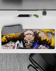 Intense 32x12 mouse pad features Law's powerful stance and radiant energy for One Piece fans