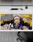 Bold 32x16 mouse pad combines Law's signature smirk with sleek golden design for impactful visuals