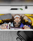 Striking 36x16 desk pad highlights Law's powerful aura and iconic details for One Piece enthusiasts