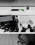 Bold 36x16 desk pad featuring Gojo Satoru's black and white art from Jujutsu Kaisen for dynamic setups