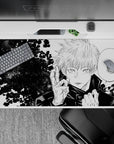 Intricate 40x20 desk pad showcasing Gojo Satoru's determined expression from Jujutsu Kaisen for fans