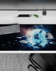 Dark sci-fi desk pad 36x16 inches in deep black with icy blue light accents for a calm, clean setup.